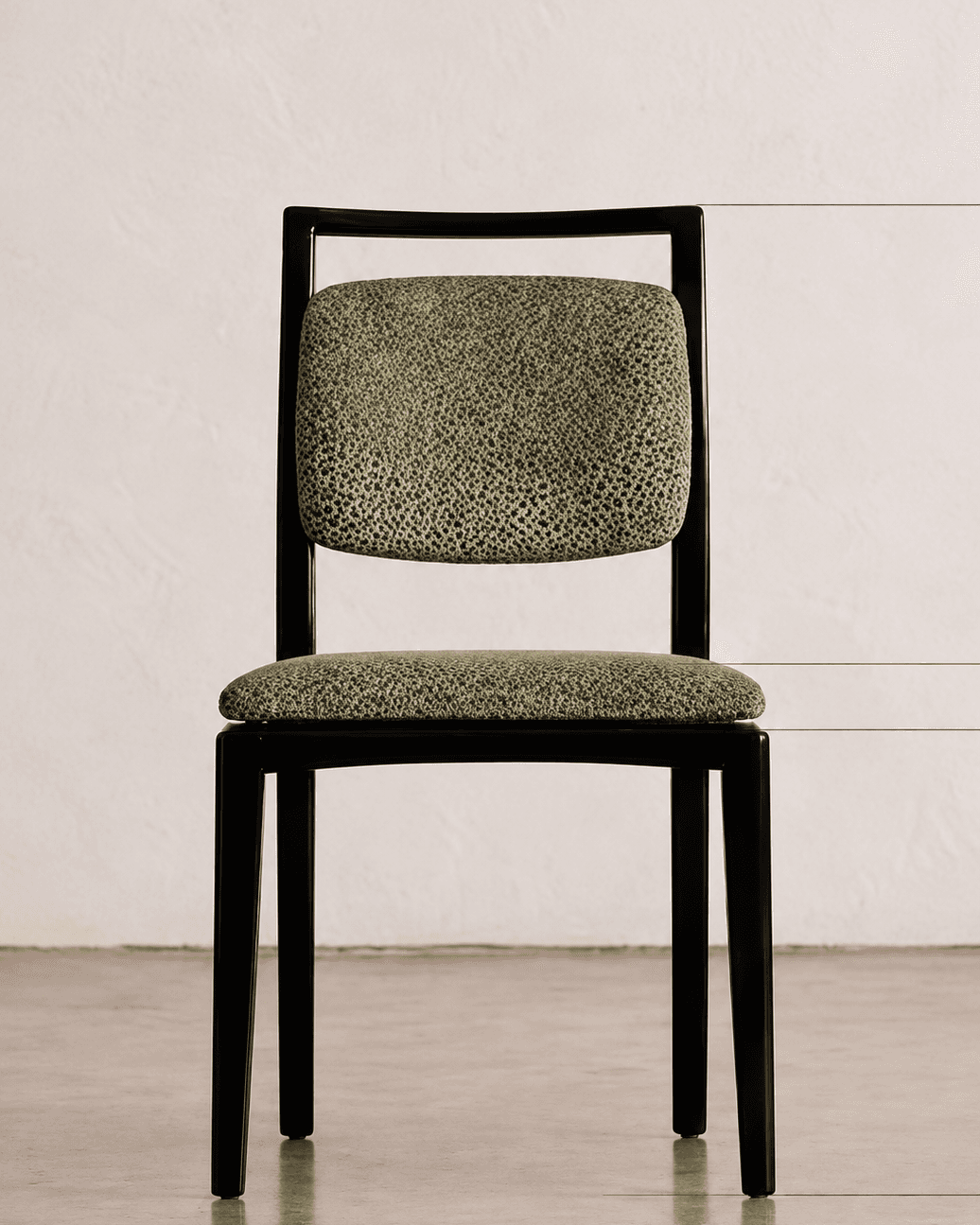 VERA premium dining chair with black wooden frame, textured olive-green upholstered seat and compact padded backrest shown from the front.