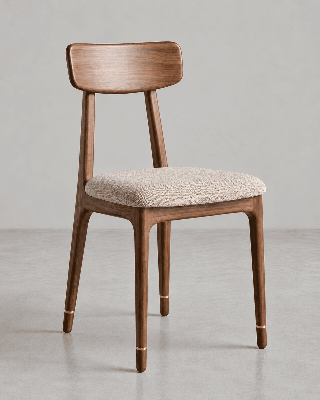 SENA premium wooden dining chair with rounded walnut backrest, beige upholstered seat and tapered wooden legs with brass accents.